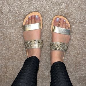 Gorgeous metallic gold and rhinestone strapped slide on sandals